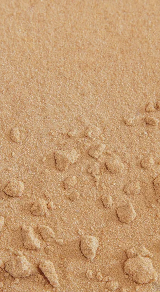 茶色の砂のテクスチャの垂直クローズアップショット — ストック写真