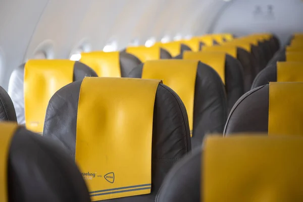 stock image BARCELONA, SPAIN - Aug 13, 2021: A shot of empty seats of a Vueling plane in times of COVID-19 in Barcelona