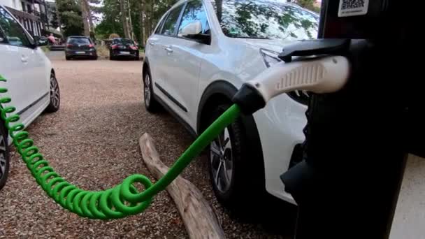 Electric Car Connected Charging Cable — Vídeo de stock