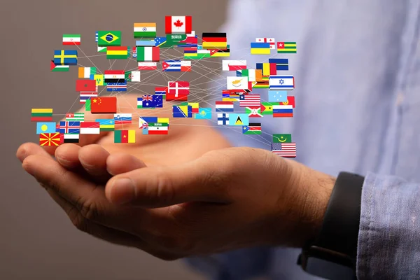 Una Rappresentazione Una Mano Maschile Bandiere Diversi Paesi — Foto Stock