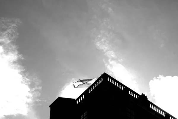 Monochrome Shot Torn Danish Flag Waving Cloudy Sky Background — Stock Photo, Image