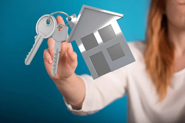 Mão Uma Mulher Apontando Para Uma Casa Ilustrada Chaves Fundo — Fotografia de Stock