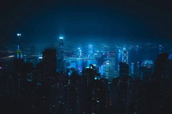 Flygbild Modern Stad Med Skyskrapor Upplysta Med Blått Ljus Nätterna — Stockfoto