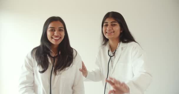 Footage Couple Young Indian Female Doctors Working Together — Vídeos de Stock