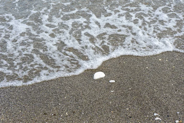 Beautiful View Pebbles Seafoam Seashore — Stock Photo, Image