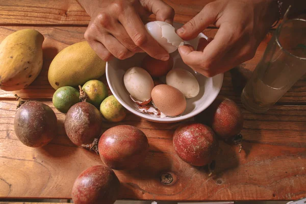 Closeup Person Hands Peeling Eggs Table Tropical Fruits — Stock Photo, Image