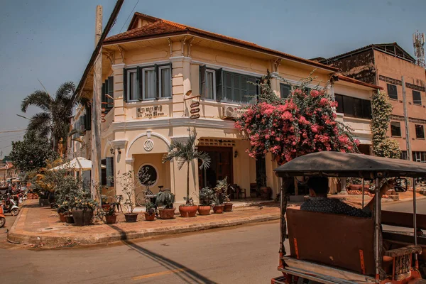 KAMPOT, CAMBODIA - Feb 14, 2020: The old French colonial buildings and houses along the old market streets of Kampot, Cambodia.