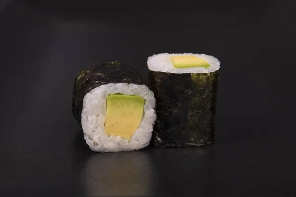 Closeup Avocado Maki Rolls Black Background — Stock Photo, Image