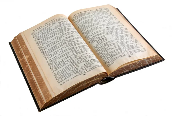 白い背景に隔絶された古い開いている聖書の本のショット — ストック写真