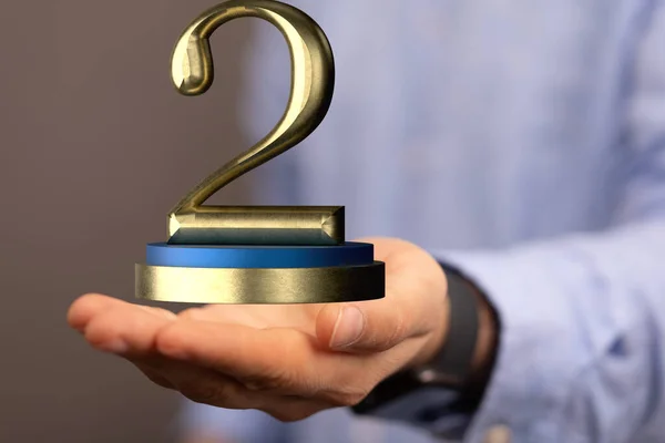 3D在一个人的手掌上绘制了2号 为期两年或二等奖 — 图库照片
