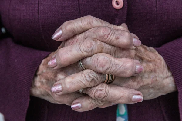 Elderly Lady Crossed Hands Pink Manicure Rings — Stock Photo, Image