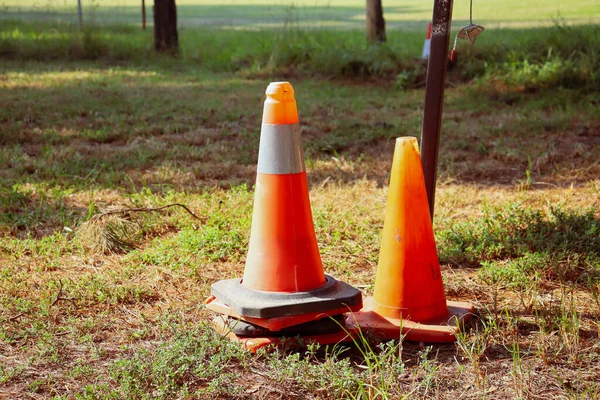 Several Traffic Cones Grass Outdoors Royalty Free Stock Photos