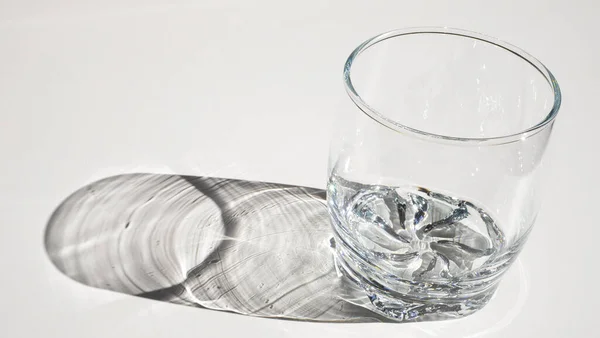 Closeup Emp Glass White Surface — Stock Photo, Image