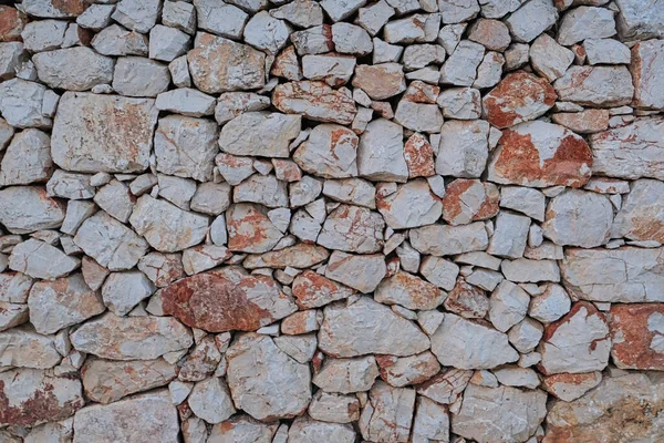 Drywall in southern Italy with regional stones