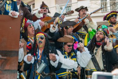 CADIZ, SPAIN - Feb 24, 2009: The Chirigotas and choirs perform for a multitude in the streets of Cadiz, Spain during  carnival clipart