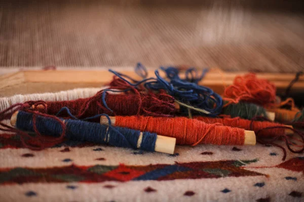 A closeup shot of colorful cotton threads for sewing