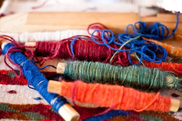 A closeup shot of colorful cotton threads for sewing