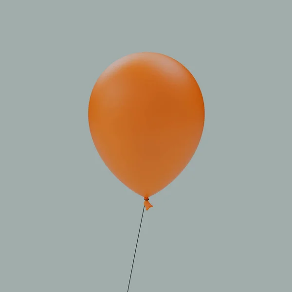 Gri Arka Planda Izole Edilmiş Turuncu Bir Cadılar Bayramı Balonu — Stok fotoğraf