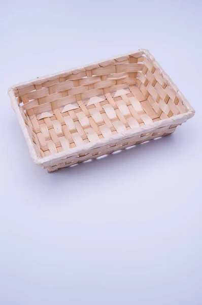 Closeup Empty Wicker Basket Isolated Blue Background Copy Space — Stock Photo, Image