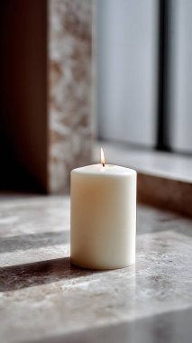 A white candle burns peacefully on a luxurious marble surface, creating a calm, warm, and highly aesthetic atmosphere for relaxation.
