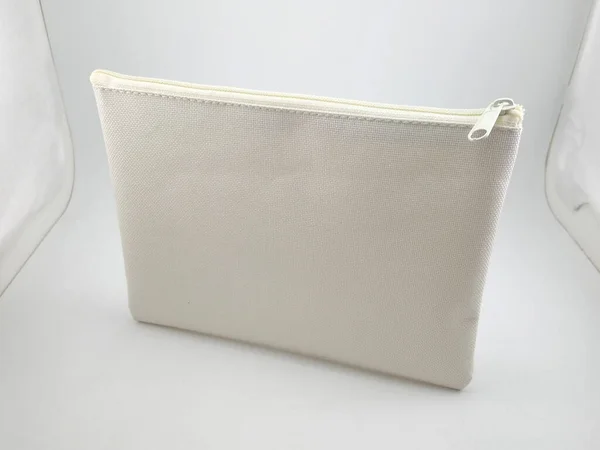 White plain hand zip bag use to store small items