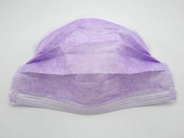 紫使い捨て外科用フェイスマスク — ストック写真