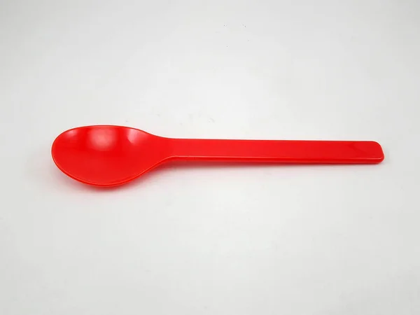 Red Plastic Disposable Spoon Scoop — Stock Photo, Image