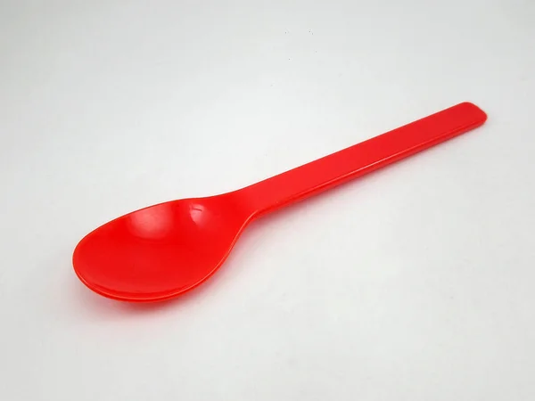 Red Plastic Disposable Spoon Scoop — Stock Photo, Image