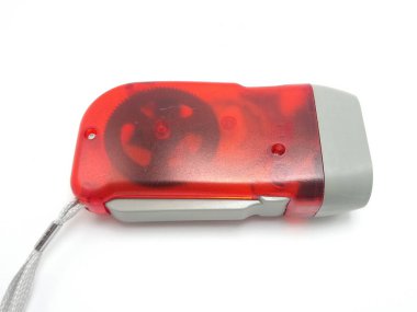 El kayışlı kırmızı taşınabilir acil durum feneri.