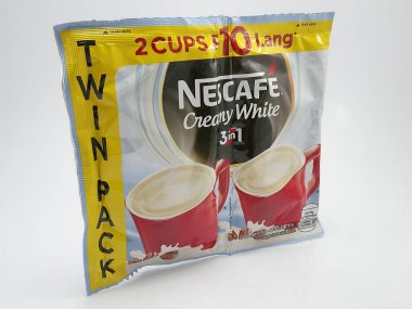 QUEZON ŞEHRİ, PH-23 - 23 Kasım 2020 'de Quezon City, Filipinler' de 1 kahvede Nescafe sütlü beyaz 3.