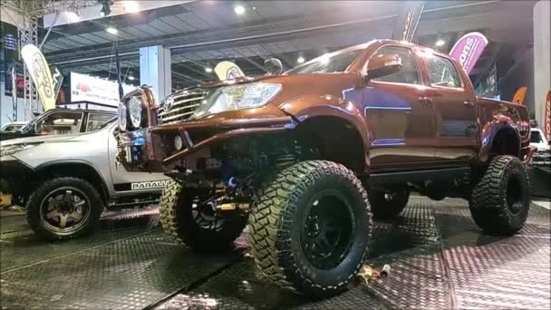 Toyota hilux pick up truck in SMX convention center, Pasay, Philippines. — Stock Video