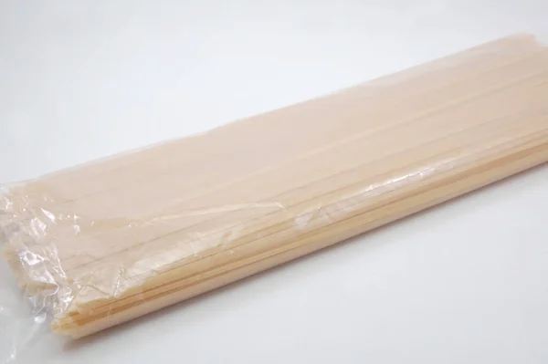 Raw Long Sticks Spaghetti Noodle Pasta Plastic Pack — Stock Photo, Image