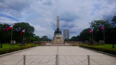 MANILA, PH - 20 Ekim - Rizal Park heykeli anıtı 20 Ekim 2018 'de Roxas Bulvarı, Manila, Filipinler' de. Rizal Park, Manila 'nın en önemli turistik yerlerinden biridir..