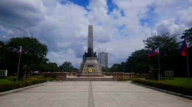 MANILA, PH - 20 Ekim - Rizal Park heykeli anıtı 20 Ekim 2018 'de Roxas Bulvarı, Manila, Filipinler' de. Rizal Park, Manila 'nın en önemli turistik yerlerinden biridir..