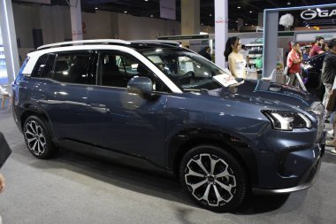 Pasay, PH - OCT 25 - Filipin elektrikli araç zirvesinde Gac aion v (PEVS) 25 Ekim 2025, Pasay, Filipinler. PEVS, Filipinler 'de düzenlenen yıllık bir otomobil etkinliğidir..