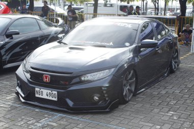 Pasay, PH-13 - Honda Civic Bumper 2 Tampon Araba Fuarı 'nda 13 Aralık 2025 Pasay, Filipinler' de. Bumper 2 Bumper, Filipinler 'de düzenlenen bir otomobil fuarıdır..