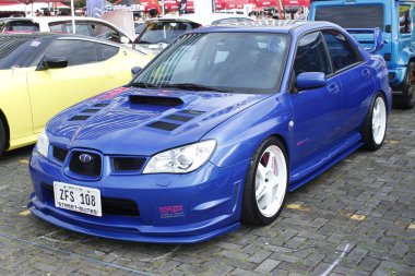 Pasay, PH-13 - Subaru impreza wrx sti Bumper 2 Tampon Araba Fuarı 'nda 13 Aralık 2025 Pasay, Filipinler. Bumper 2 Bumper, Filipinler 'de düzenlenen bir otomobil fuarıdır..