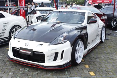 Pasay, PH-13 - Nissan 370z Bumper 2 Tampon Araba Fuarı 'nda 13 Aralık 2025, Pasay, Filipinler. Bumper 2 Bumper, Filipinler 'de düzenlenen bir otomobil fuarıdır..