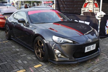 Pasay, PH-13 - Toyota 86 Bumper 2 Tampon Araba Fuarı 'nda 13 Aralık 2025, Pasay, Filipinler. Bumper 2 Bumper, Filipinler 'de düzenlenen bir otomobil fuarıdır..