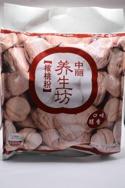 MANILA, PH - 22 Şubat - Zhongli ceviz tozu 22 Şubat 2025, Manila, Filipinler. Zhongli Çin 'de bir yemek üreticisi..