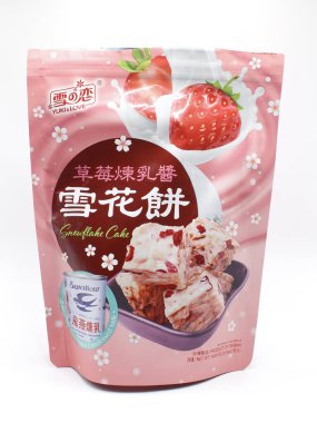 MANILA, PH - FEB 22 - Yuki ve Love yoğunlaştırılmış sütlü kar tanesi kekleri 22 Şubat 2025 tarihinde Manila, Filipinler 'de. Yuki ve Love Tayvan 'da yemek yapıyor..