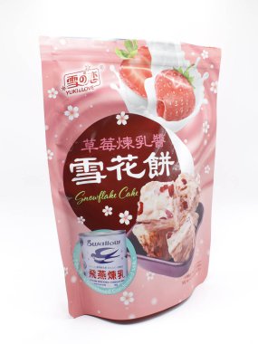 MANILA, PH - FEB 22 - Yuki ve Love yoğunlaştırılmış sütlü kar tanesi kekleri 22 Şubat 2025 tarihinde Manila, Filipinler 'de. Yuki ve Love Tayvan 'da yemek yapıyor..