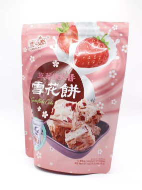 MANILA, PH - FEB 22 - Yuki ve Love yoğunlaştırılmış sütlü kar tanesi kekleri 22 Şubat 2025 tarihinde Manila, Filipinler 'de. Yuki ve Love Tayvan 'da yemek yapıyor..