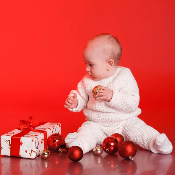 Baby boy with present — Stock Photo, Image