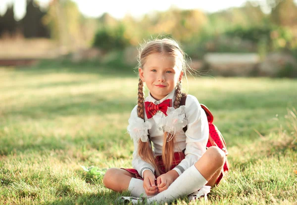 Little girl wearing school uniform — Stock Photo, Image