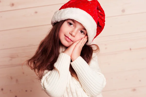 Mały dziewczyna sobie santa hat — Zdjęcie stockowe