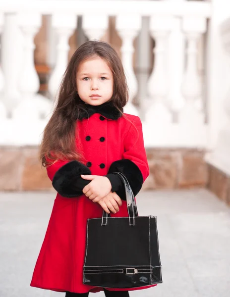 Elegante bambina con borsetta — Foto Stock