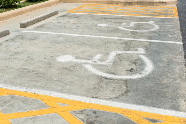 Σύμβολα στάθμευσης για τα άτομα με αναπηρία Εικόνα Αρχείου