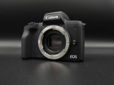 Canon EOS M50 mark ii (M 50m 2) Body black on black background. One of the best cameras for bloggers. clipart