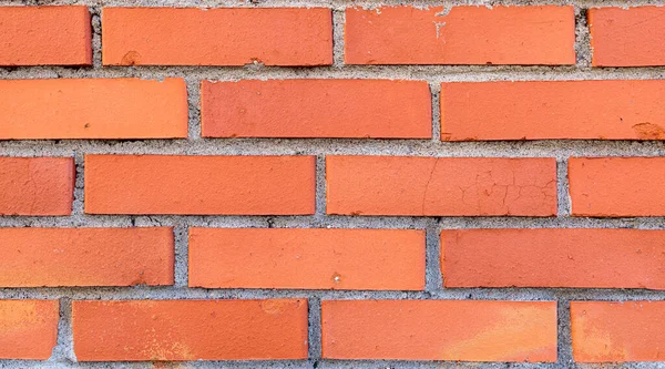red brick wall, structure of stone and cement